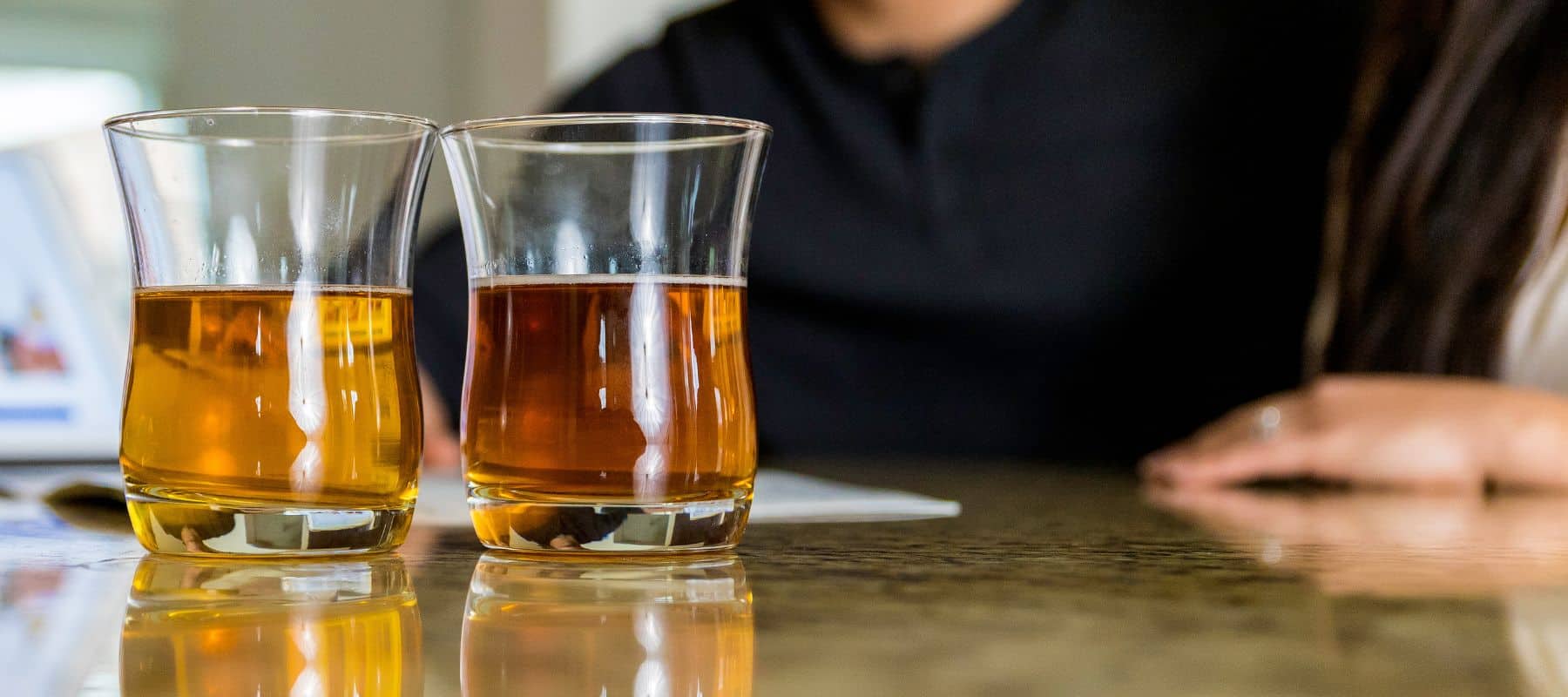 brown water in glasses